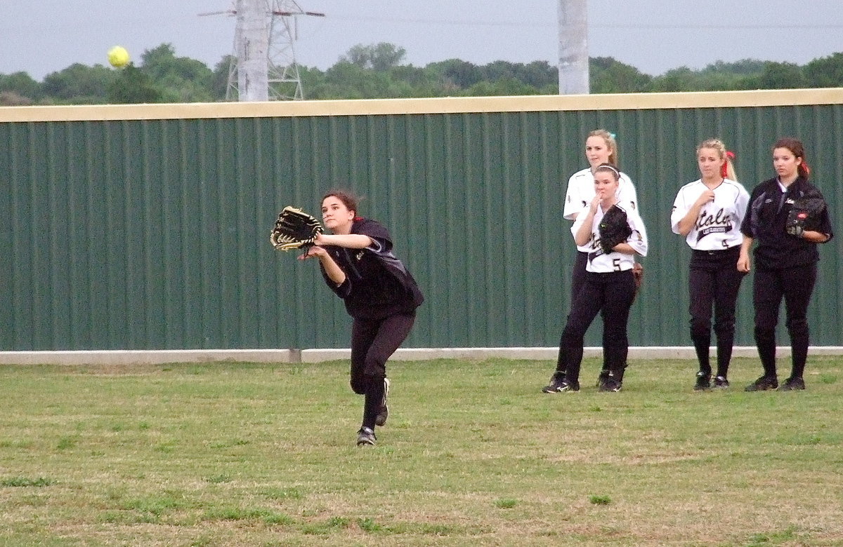 Image: Cassidy Childers(3) goes after a popup during the pre-game.