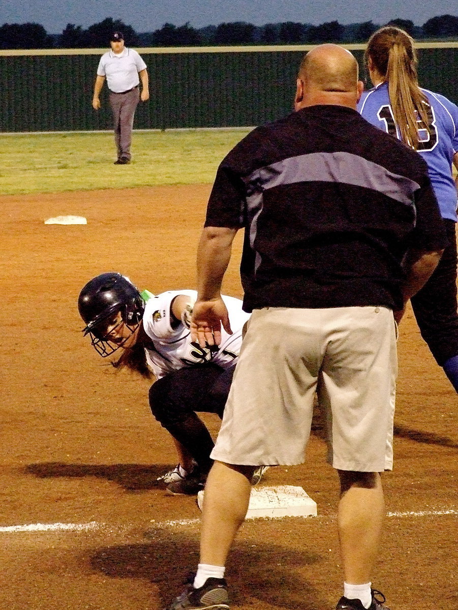 Image: Bailey Eubank(1) slides into third at the request of Lady Gladiator head coach Wayne Rowe. Eubank would later make the score 3-1.