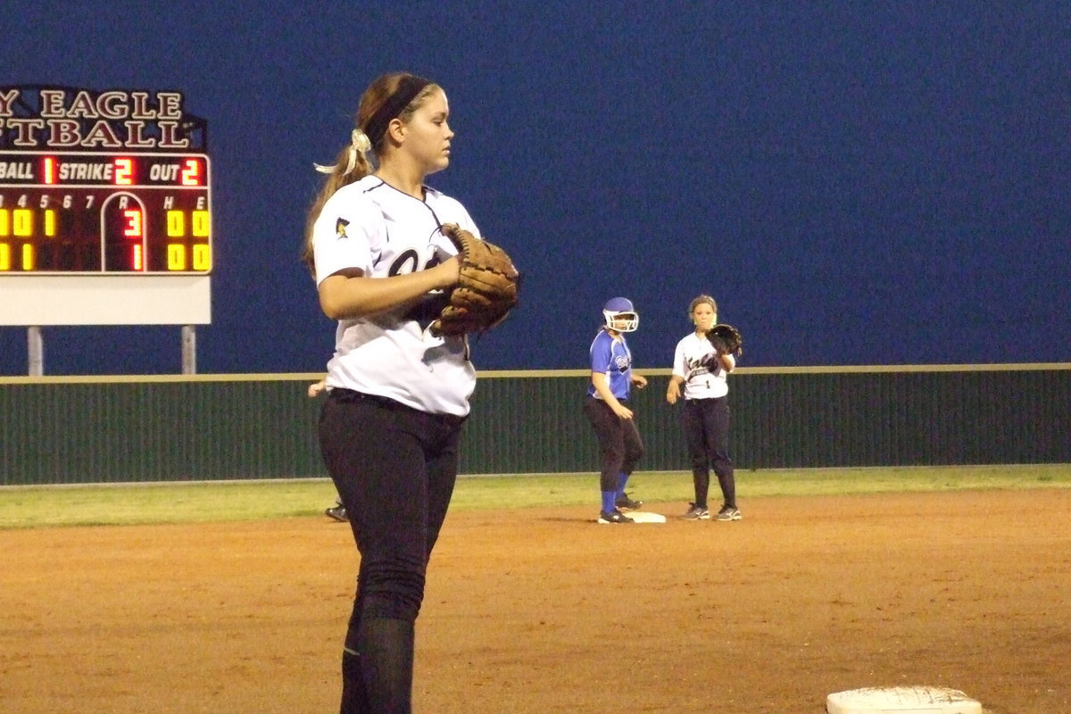 Image: Italy third baseman Paige Westbrook(10) holds a Bosqueville runner at second.