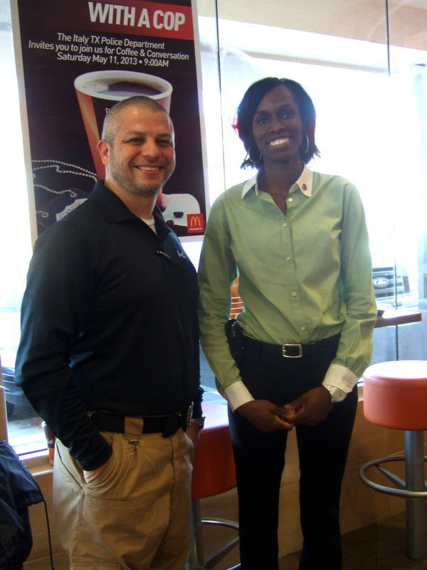 Image: Officer Gonzalez and Jonnetta Hardin (owner/operator of McDonalds) are happy to meet and greet community members.