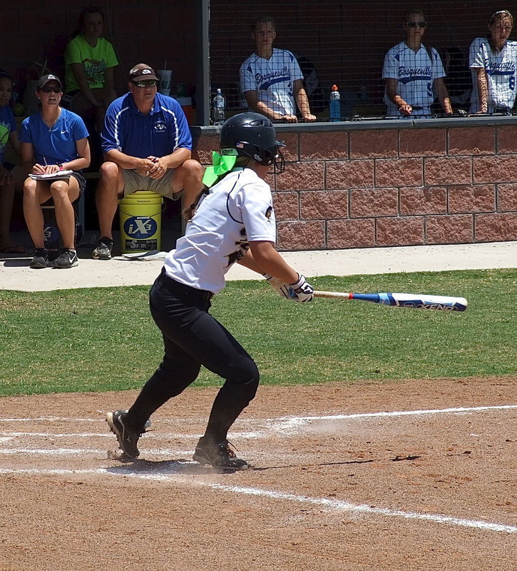 Image: Italy’s Bailey Eubank(1) hits the ball and then hurries to first base.