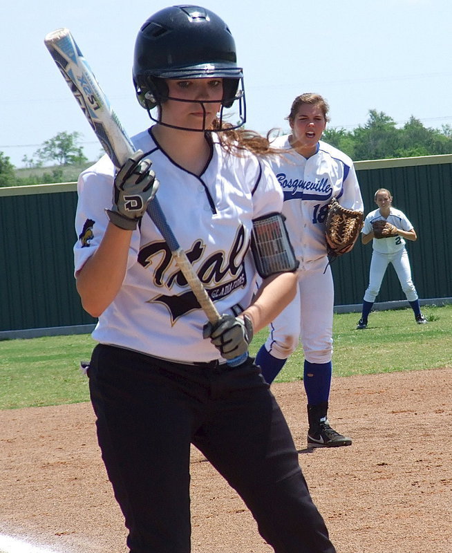 Image: Italy’s Morgan Cockerham(8) battles at the plate with the game’s intensity picking up speed.