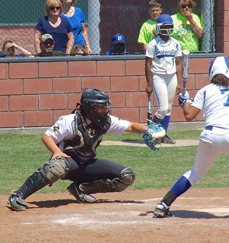 Image: Senior catcher Alyssa Richards(9) works the strike zone for pitcher Jaclynn Lewis.