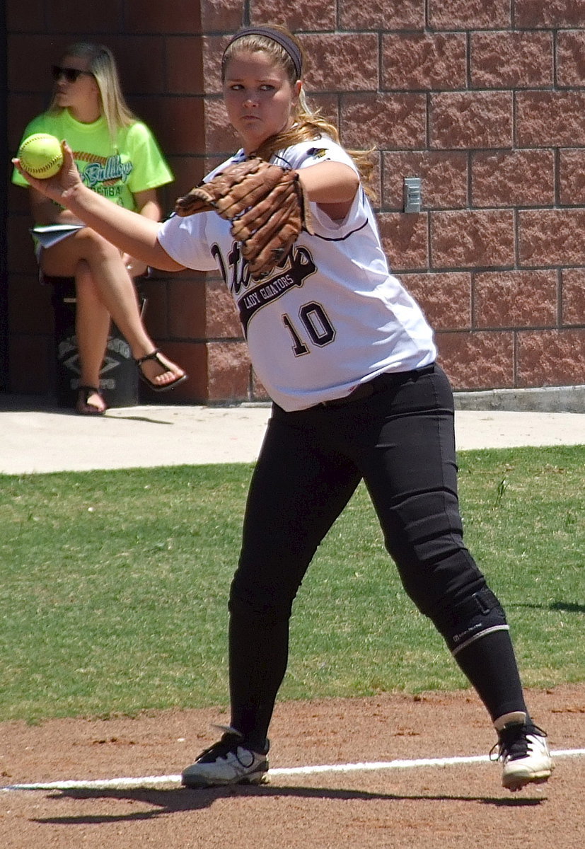 Image: Third baseman Paige Westbrook(10) is intense as Bosqueville prepares to bat.