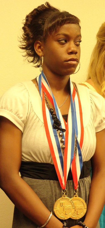 Image: State record breaking UIL Track and Field star Kortnei Johnson