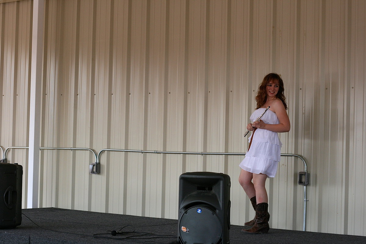 Image: 8th grader, Sarah Levy, showed the audience how wonderful she can play her flute.