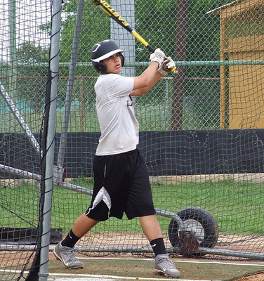 Image: Reid Jacinto taking swings.