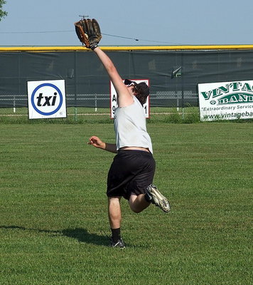 Image: Kyle Fortenberry makes an over-the-shoulder catch.