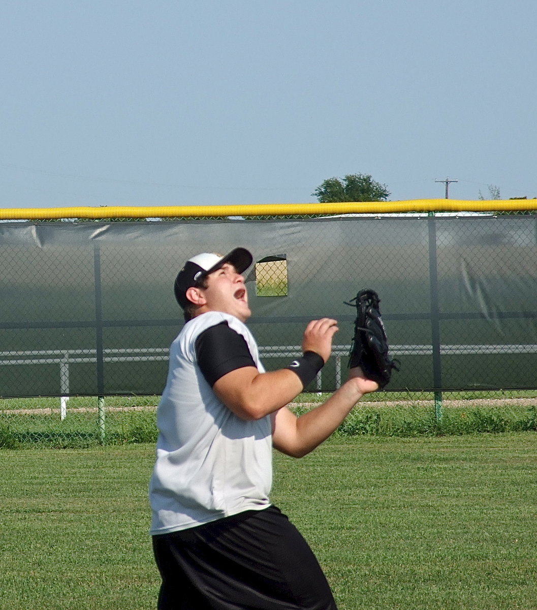 Image: Kevin Roldan simulates crowd noise to put extra pressure on himself while making the catch in preparation for tomorrow’s playoff game.