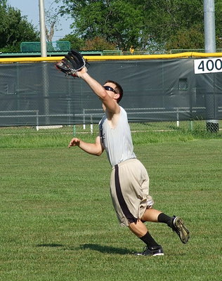 Image: Center fielder Chase Hamilton tracks down the ball.