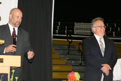Image: Lee Joffre and Barry Bassett invite the students to receive their awards.