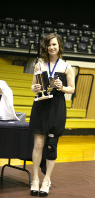 Image: Meagan Hooker received her Salutatorian trophy.