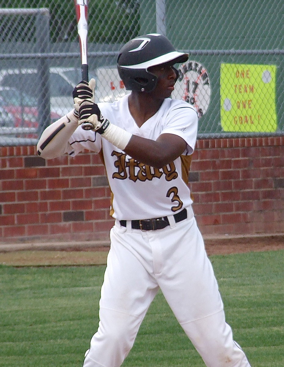 Image: Senior Marvin Cox(3) battles at the plate for Italy.