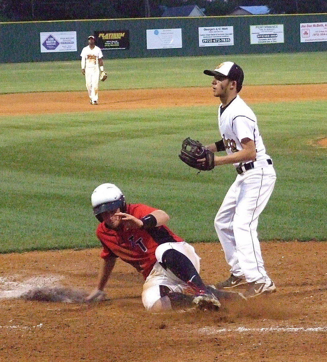 Image: Trenton scores their their 2nd run in the bottom of the fifth-inning with Italy pitcher Caden Jacinto(2) unable to stop the Trojans from increasing their lead.