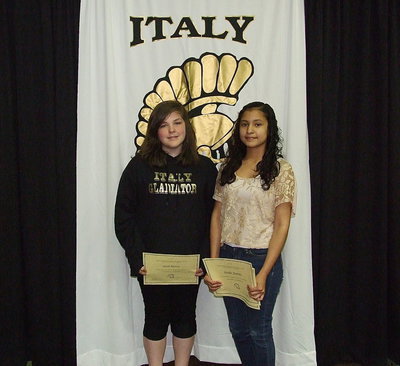 Image: Sarah Burrow and Jennifer Ramirez pose for a picture after receiving awards during the ceremony.