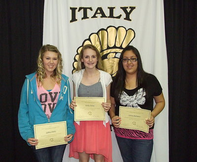 Image: 7th graders Sydney Weeks, Kirby Nelson and Lorena Rodriguez are all smiles after receiving their Citizenship awards.