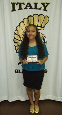 Image: 8th grader Vanessa Cantu receives a plaque for having no tardies.