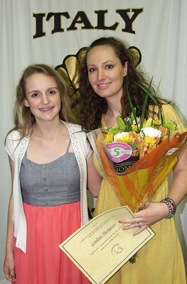 Image: 7th grade’s Favorite Teacher of the Year is Lindsey Thompson with Kirby Nelson, presenting the award.