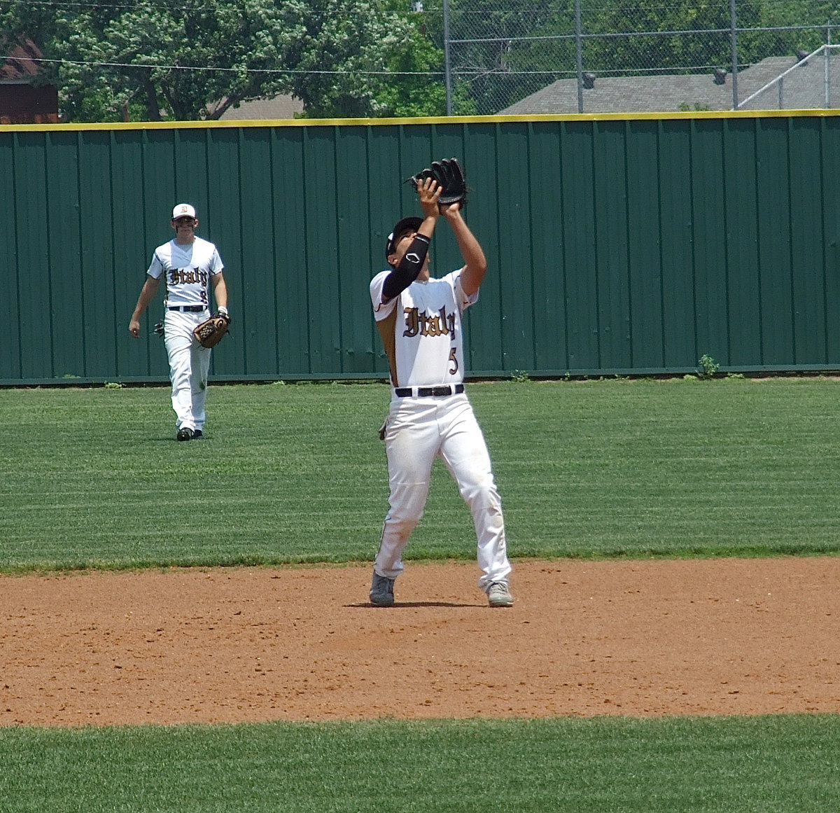 Image: Gladiator second baseman, Reid Jacinto(5) catches a popup for an out.