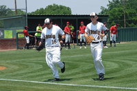 Image: Kevin Roldan(16) and Cody Boyd(4) hustle in after pre-game warmups before the start of Italy’s regional quarterfinal matchup against Trenton.