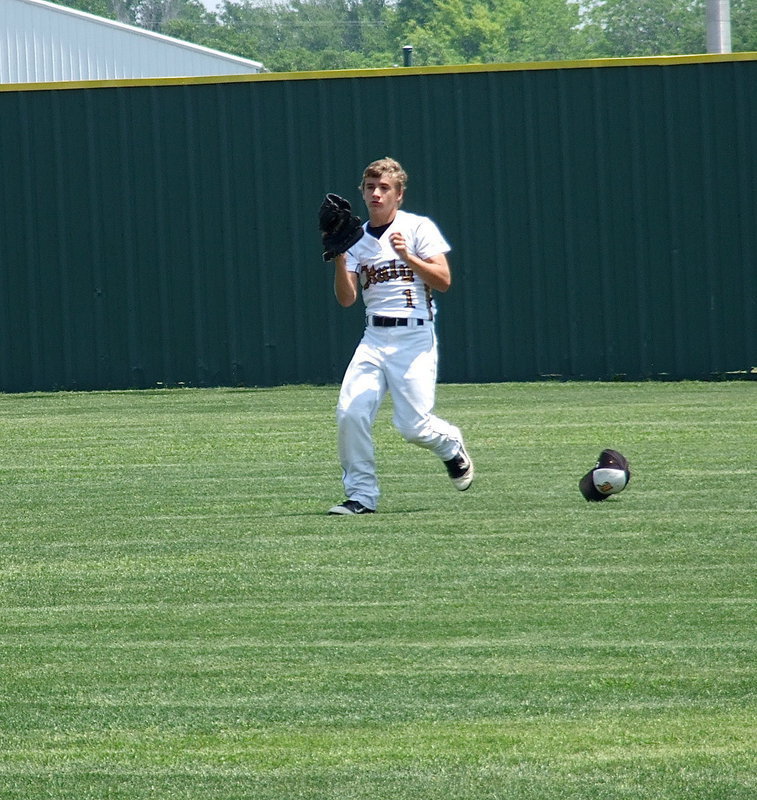 Image: Freshman Levi McBride(1) gets some work in before the game.