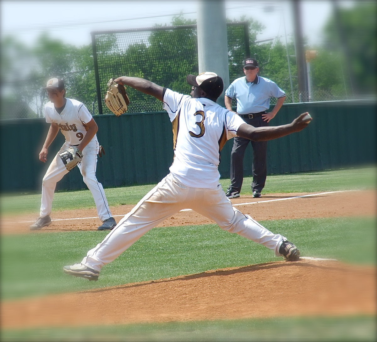 Image: Marvin Cox(3) goes in to pitch for Italy late in the game.