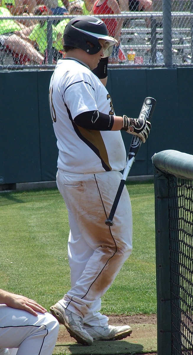 Image: Designated hitter, John Byers(18) prepares to bat for Italy.