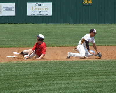 Image: Trenton steals second base while Italy’s Reid Jacinto(5) keeps the ball from going into the outfield.