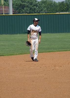 Image: Caden Jacinto(2) ponders his final moments as an Italy Baseball player while covered with the stains of being in battle.