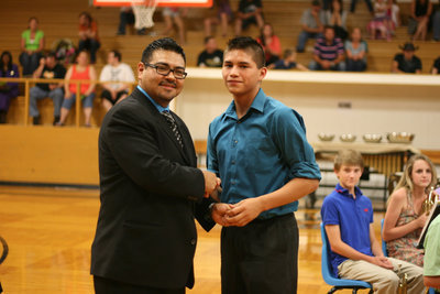 Image: 8th grader, Joseph Celis, received the Brass Caption Award.