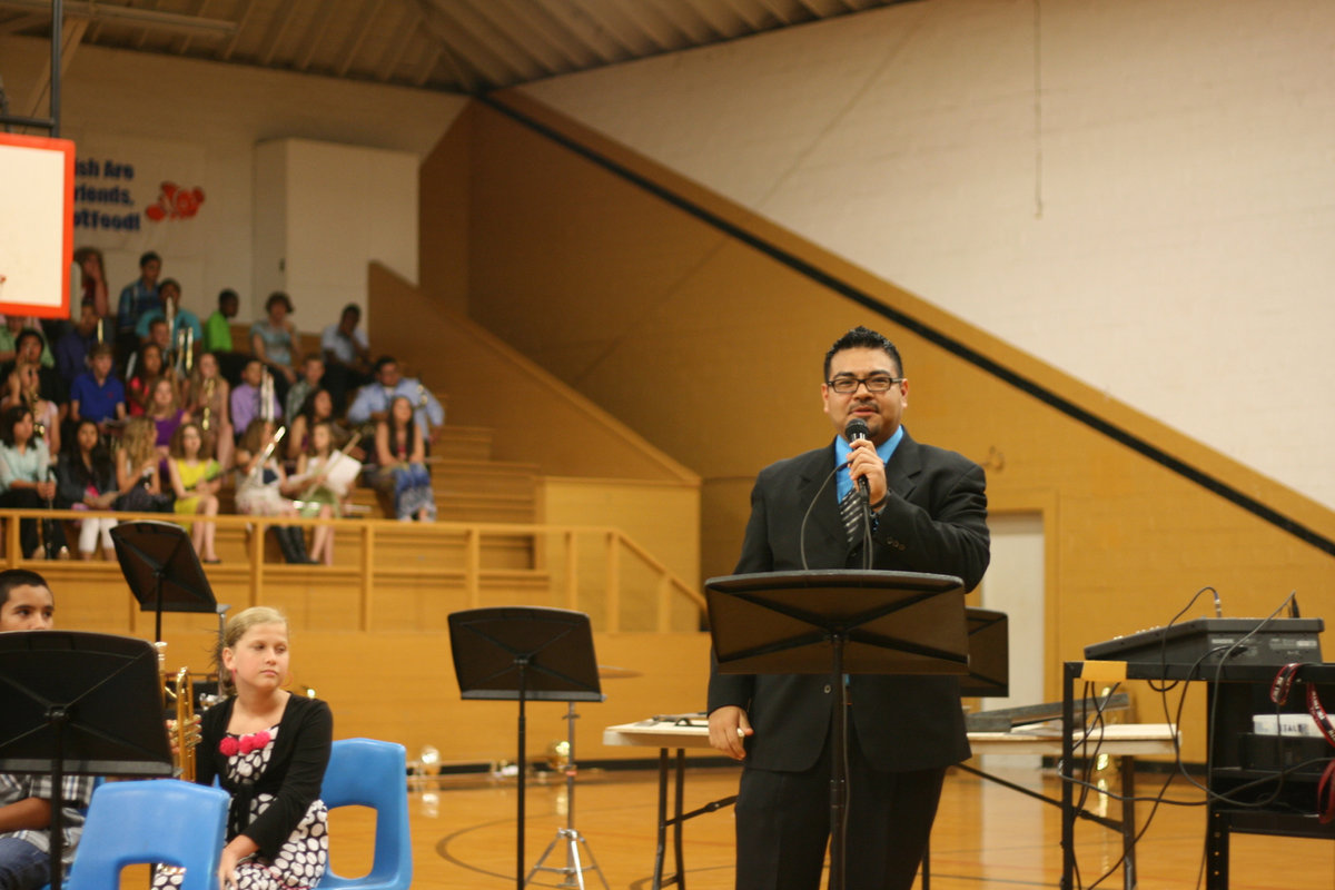 Image: Mr. Perez announced the Band Boosters gave $8500 in scholarships to the seniors this year.