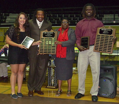 Image: Receiving the 2012 Keith Davis Award are Alyssa Richards and Ryheem Walker as Keith Davis and his mother Brenda Davis present the award. In a nice touch, Both Richards and Walker receive separate personalized plaques to keep while the eternal plaques remain at the school.