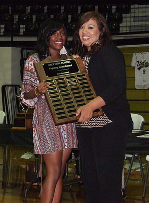 Image: The recipient of the 2013 Fighting Heart Award as a member of the Lady Gladiator Basketball team is Kendra Copeland with assistant basketball coach Tina Richards presenting.