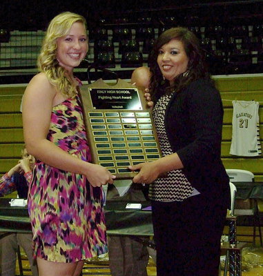 Image: Jaclynn Lewis is awarded the Fighting Heart Award in Volleyball with assistant coach Tina Richards presenting.