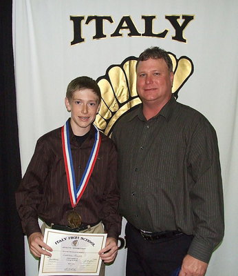 Image: Pictured with his father, Rusty Merimon, is freshman Gladiator, Clayton Miller, who displays his State semifinal medal and certificate of achievement.