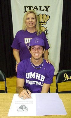 Image: Cole Hopkins with his super-proud mother, Cassandra Hopkins, during Cole’s signing of his letter of intent to play basketball for the University of Mary Hardin-Baylor Crusaders.
