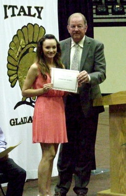 Image: City of Italy mayor, James Hobbs,presents the W.R. Gorman Memorial Masonic Education Scholarship to Courtney Russell.