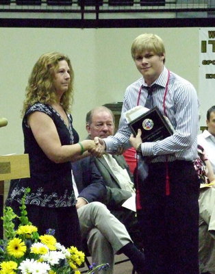 Image: Cynthia Nance presents the Shelley Nance Memorial Scholarship to Gus Allen for $1,000.
