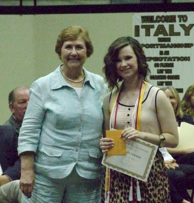 Image: The Italy ISD George E. Scott Memorial Scholarship for $500 per semester for up to four years is presented by Wanda Scott to graduating senior Meagan Hooker.