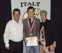 Image: Pictured with parents, Lee and DeeDee Hamilton, senior Gladiator, Chase Hamilton, displays his State semifinal medal and certificate of achievement during the 2013 Italy Athletic Banquet.