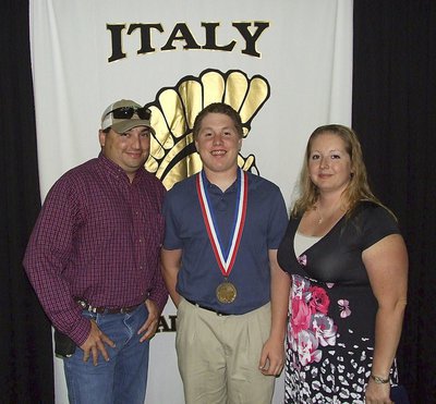 Image: Pictured with parents, Jason and Misty Escamilla, sophomore Gladiator, John Escamilla, displays his State semifinal medal.