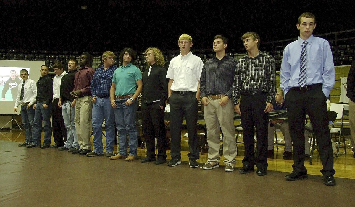 Image: The boys track team is introduced.