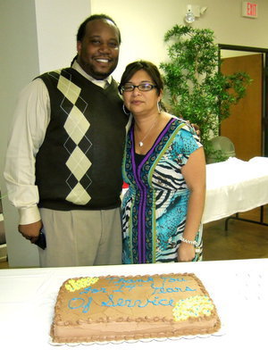 Image: City council member Dennis Perkins and city employee Manuela Martin.