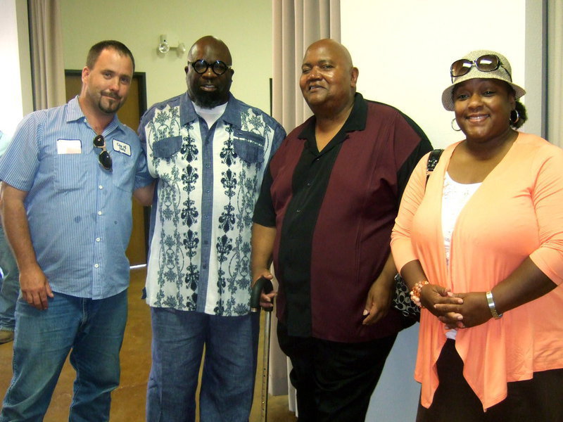 Image: Frank Jackson and friends enjoying the reception.