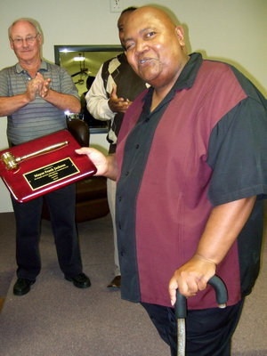 Image: Frank Jackson accepting his plaque.