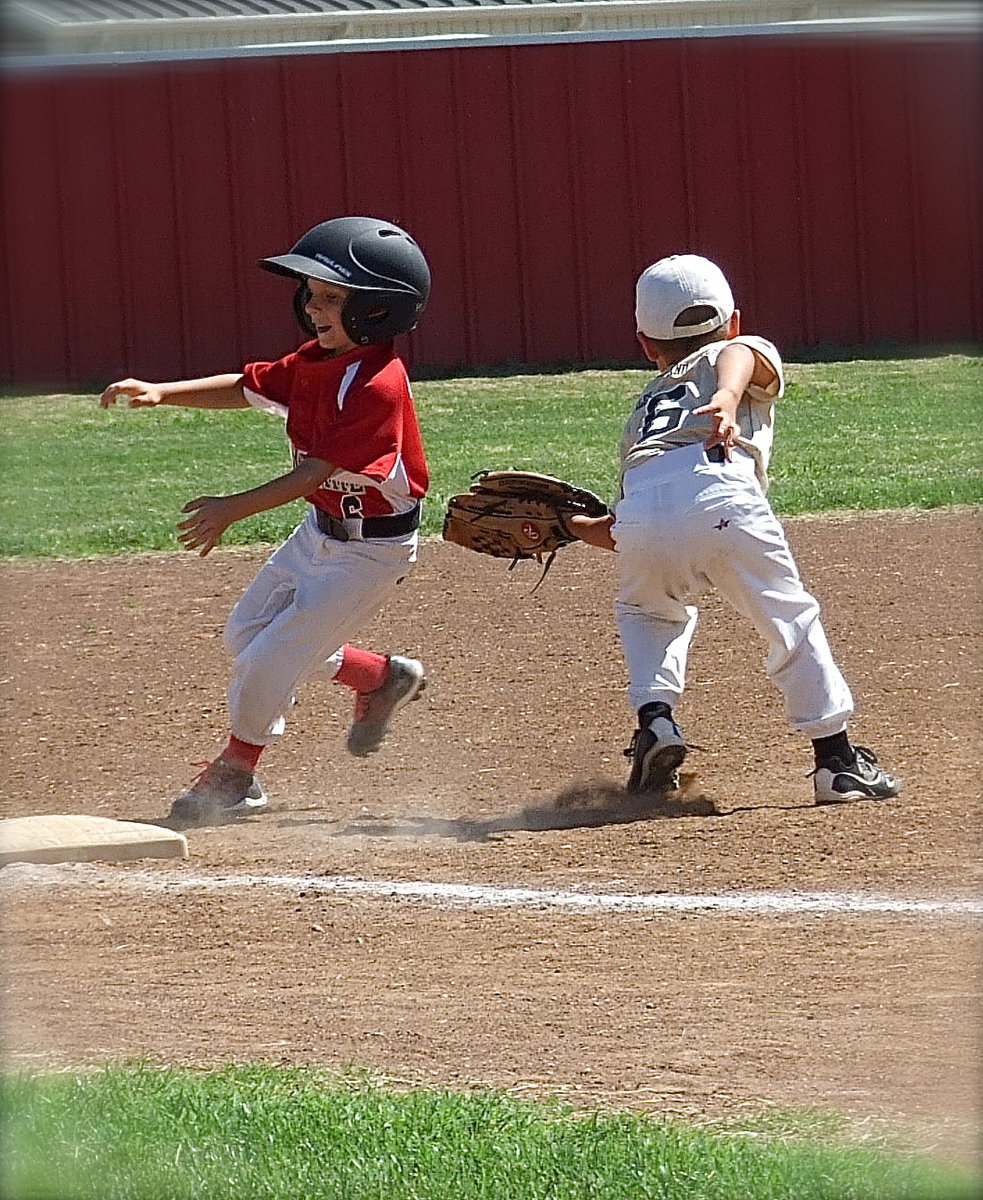 Image: Gavin Ramirez(6) tags out another Maypearl runner trying to reach third base.