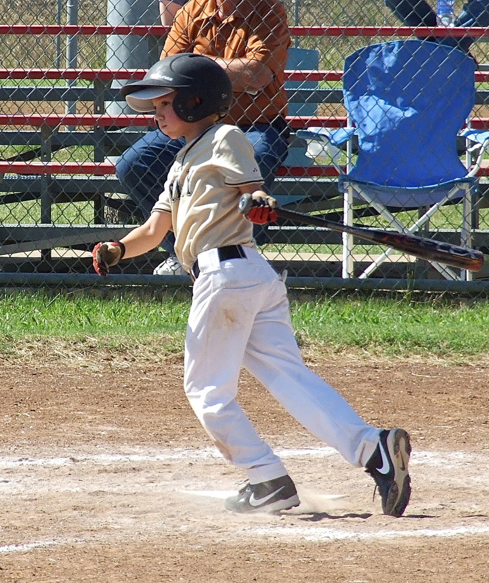 Image: Jay connects on a pitch.