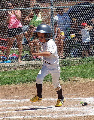 Image: Brody Hugghins scores a another run for Italy White’s cause.
