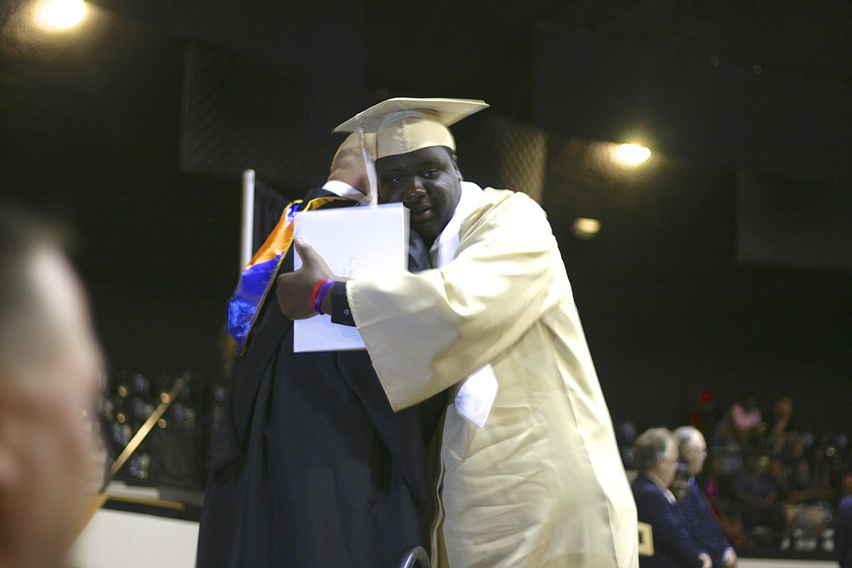 Image: Adrian Reed says goodbye with a hug.