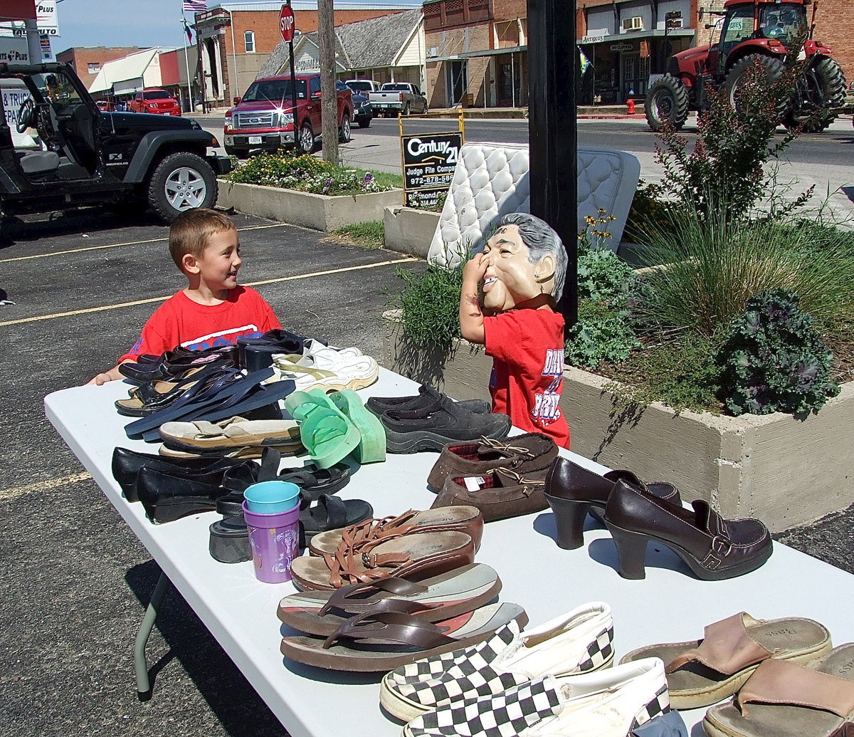 Image: The rummage sale proved to be fun for everyone, even presidents.